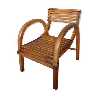 Vintage children's chair with wooden slats