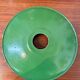 Old industrial workshop lampshade in green enamelled sheet metal.