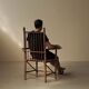 Brutalist armchair made of hazel branches, circa 1970.