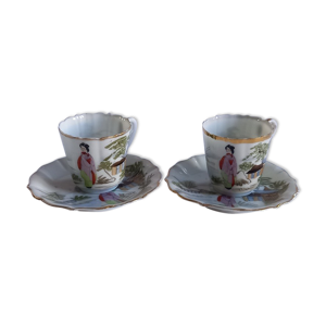 Lot composé  de 2 tasses et soucoupes