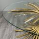 Gold metal and glass coffee table, 20th century, in the style of Robert Goos.
