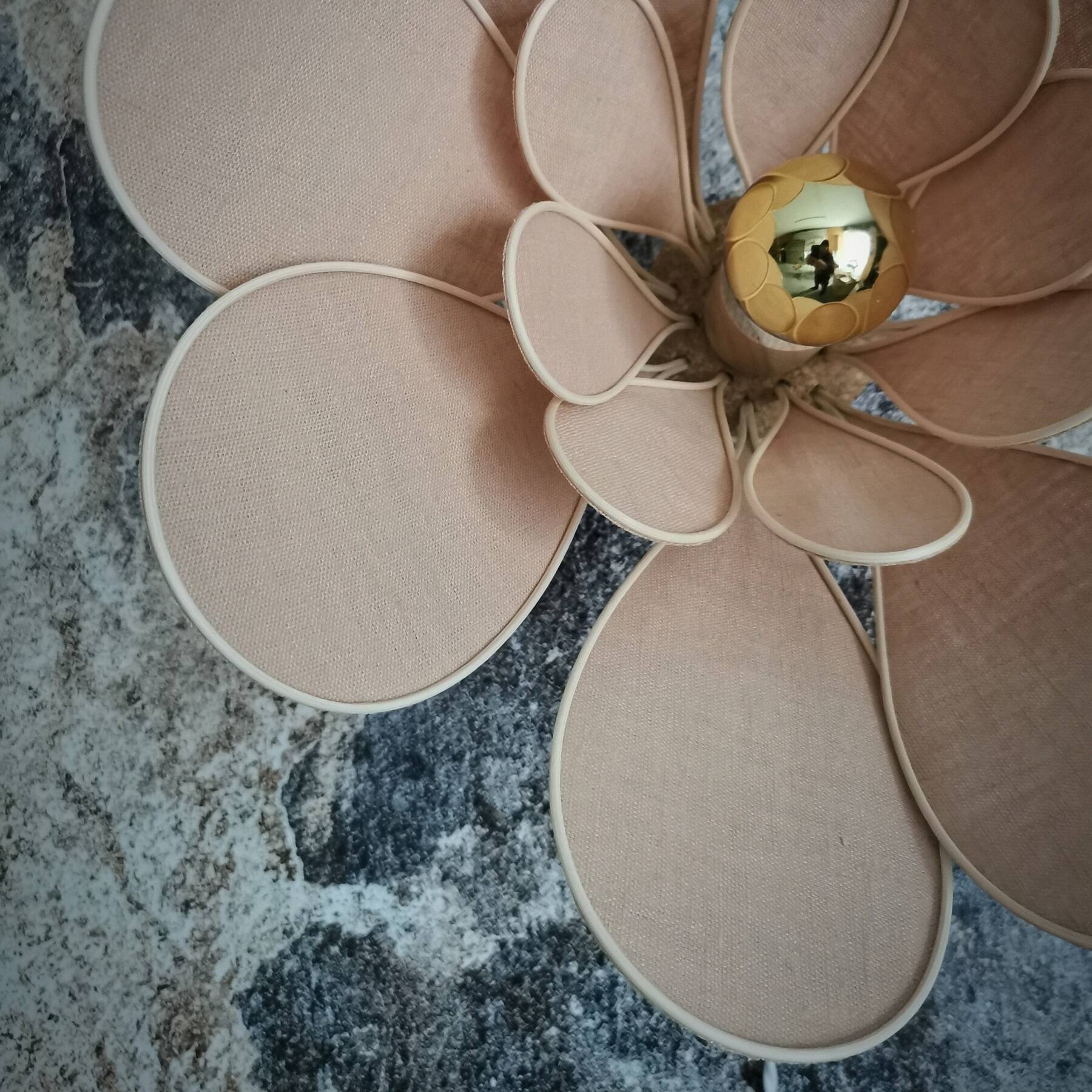 Flower wall light made of rattan and old pink linen petals