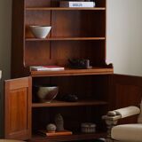 Rare high cabinet in teak by Martin Nyrop for Rud. Rasmussen, Denmark, early 20th century.