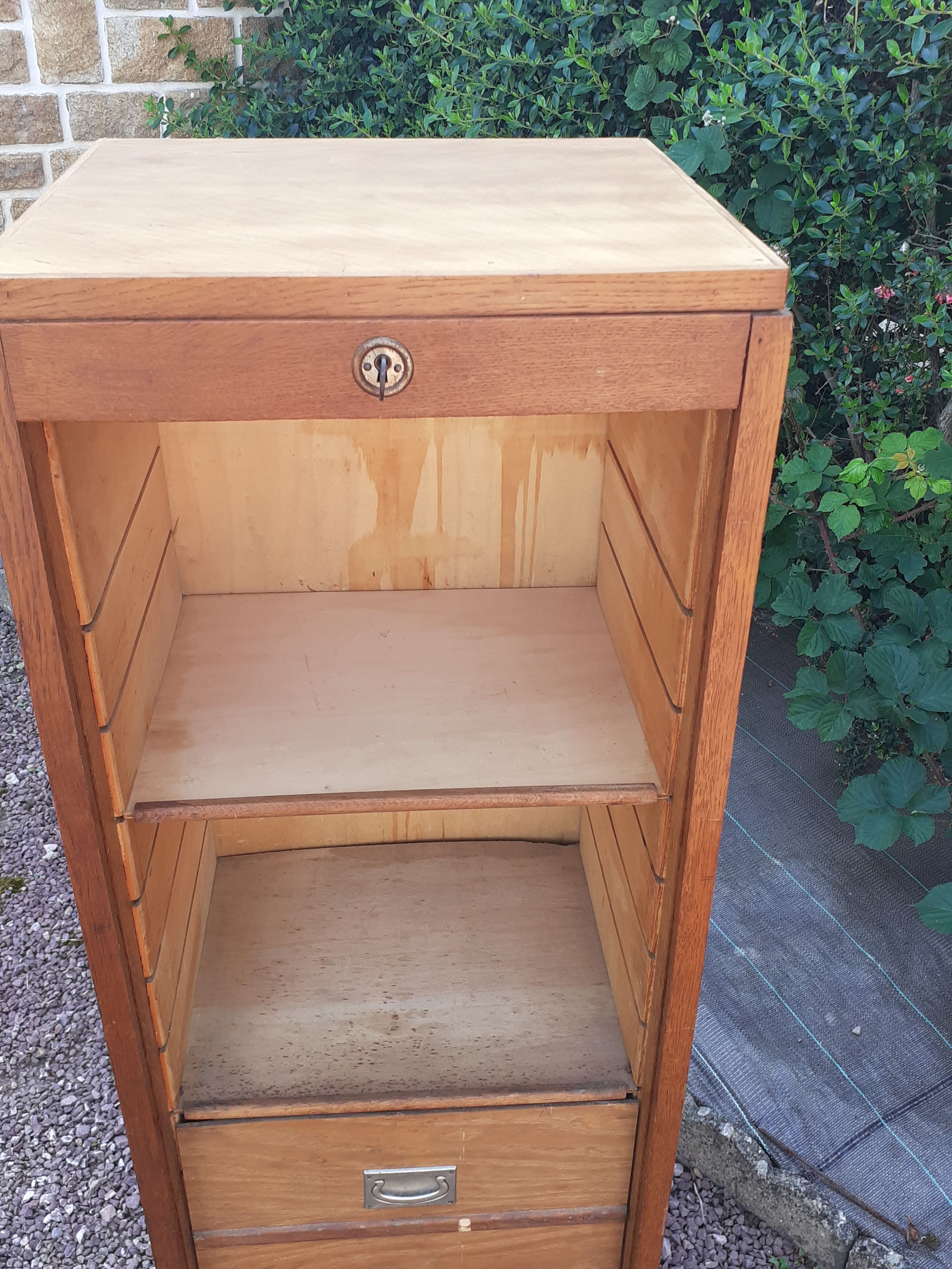 Storage cabinet locker with old wooden curtain