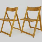Pair of vintage folding chairs in beech and canework. Italy 70s