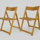 Pair of vintage folding chairs in beech and canework. Italy 70s