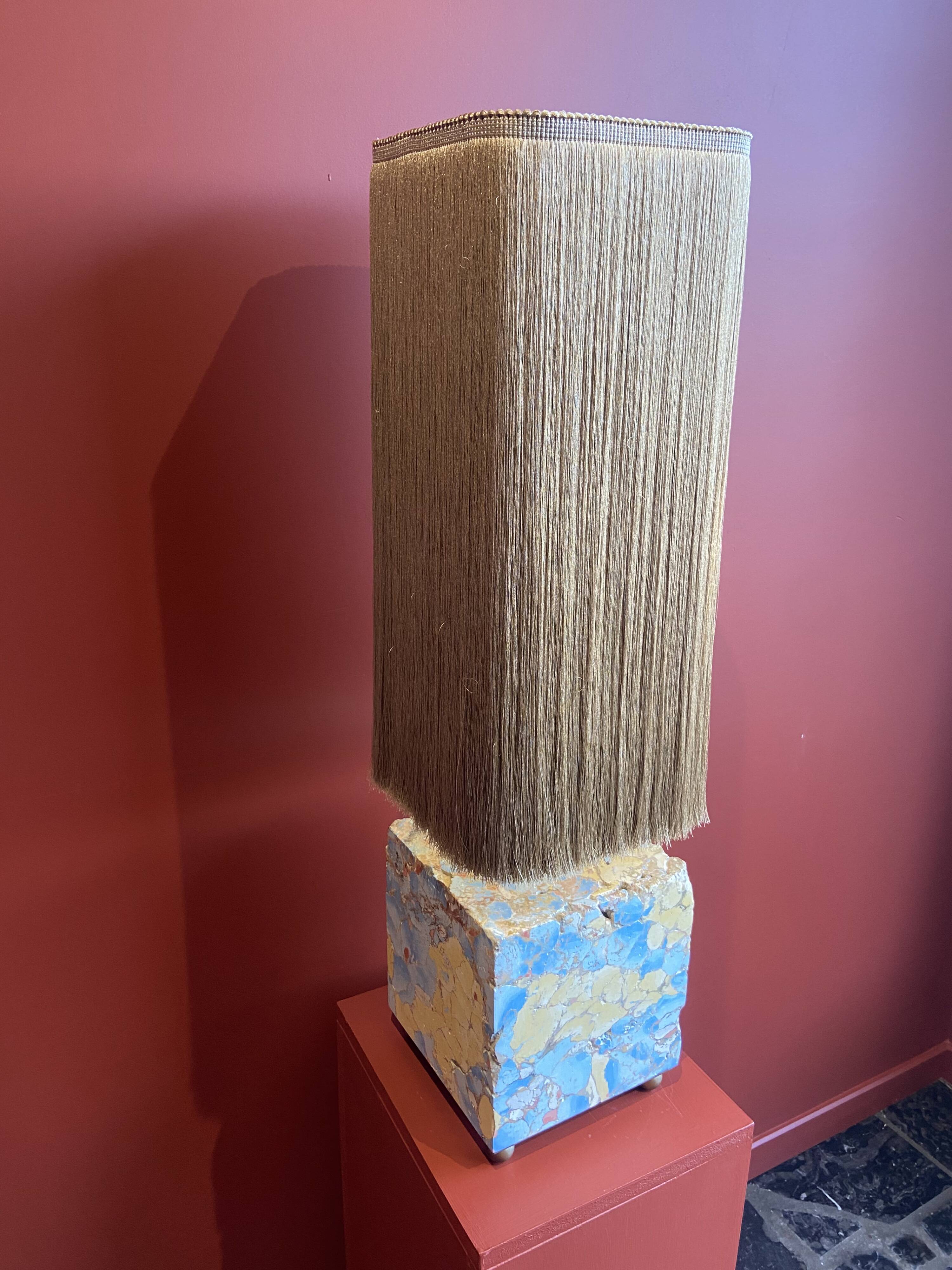 Base stuck blue beige marble-plaster, fringed lampshade Houles, 21st century.
