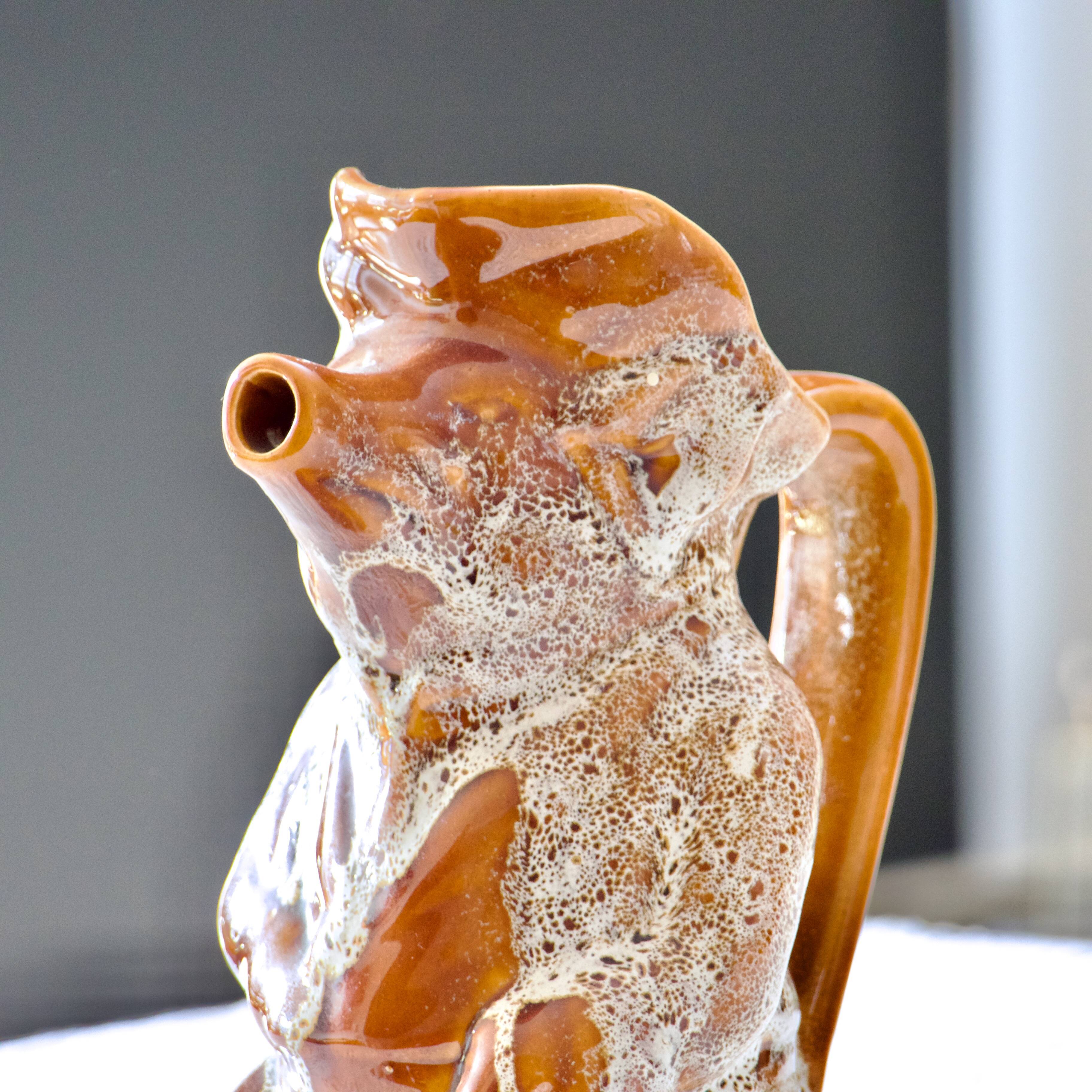 Antique zoomorphic pig carafe in foam-enameled stoneware