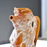 Antique zoomorphic pig carafe in foam-enameled stoneware