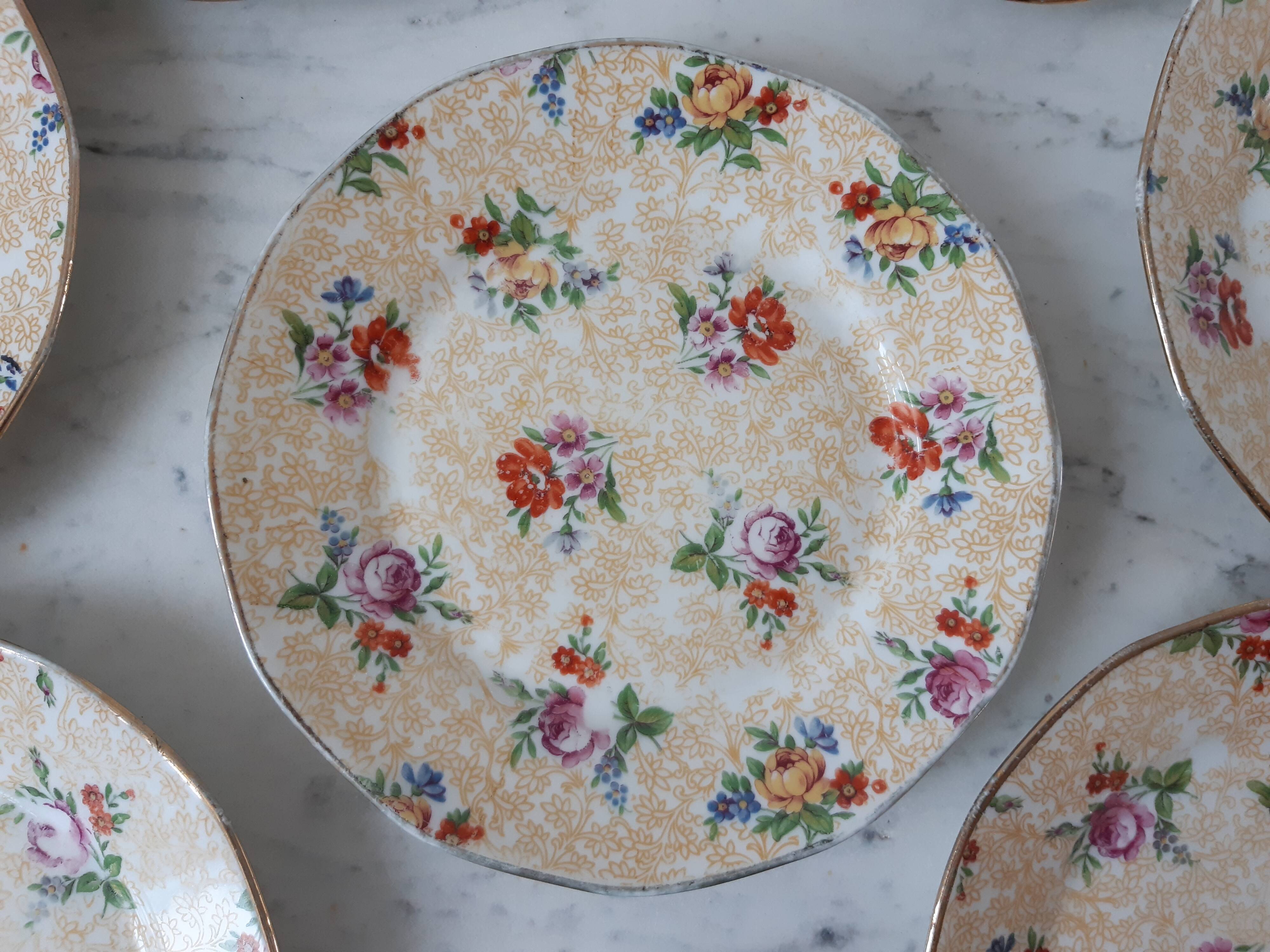 Set of 8 dessert plates, Limoges porcelain 20s