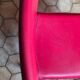 Red leather chairs by Arper