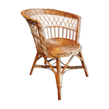 Vintage children's armchair in wicker