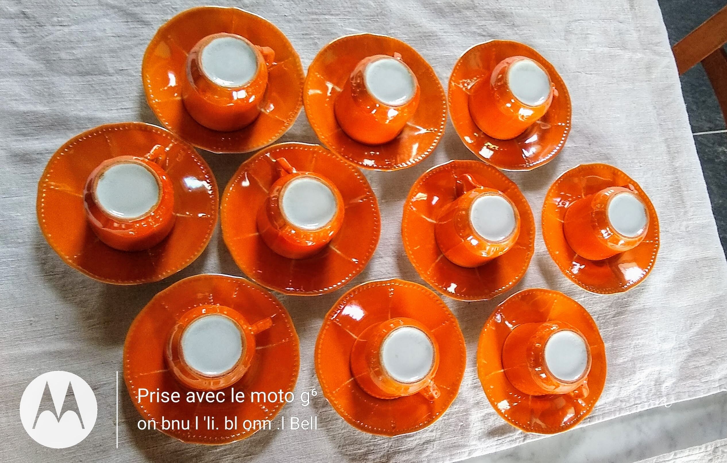 Iridescent orange porcelain coffee set from the 50s-60s with black edging
