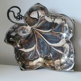 Old empty cut pocket in silver metal art nouveau in the shape of a sheet