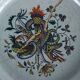 Antique plate in Rouen faience, France, mid-19th century