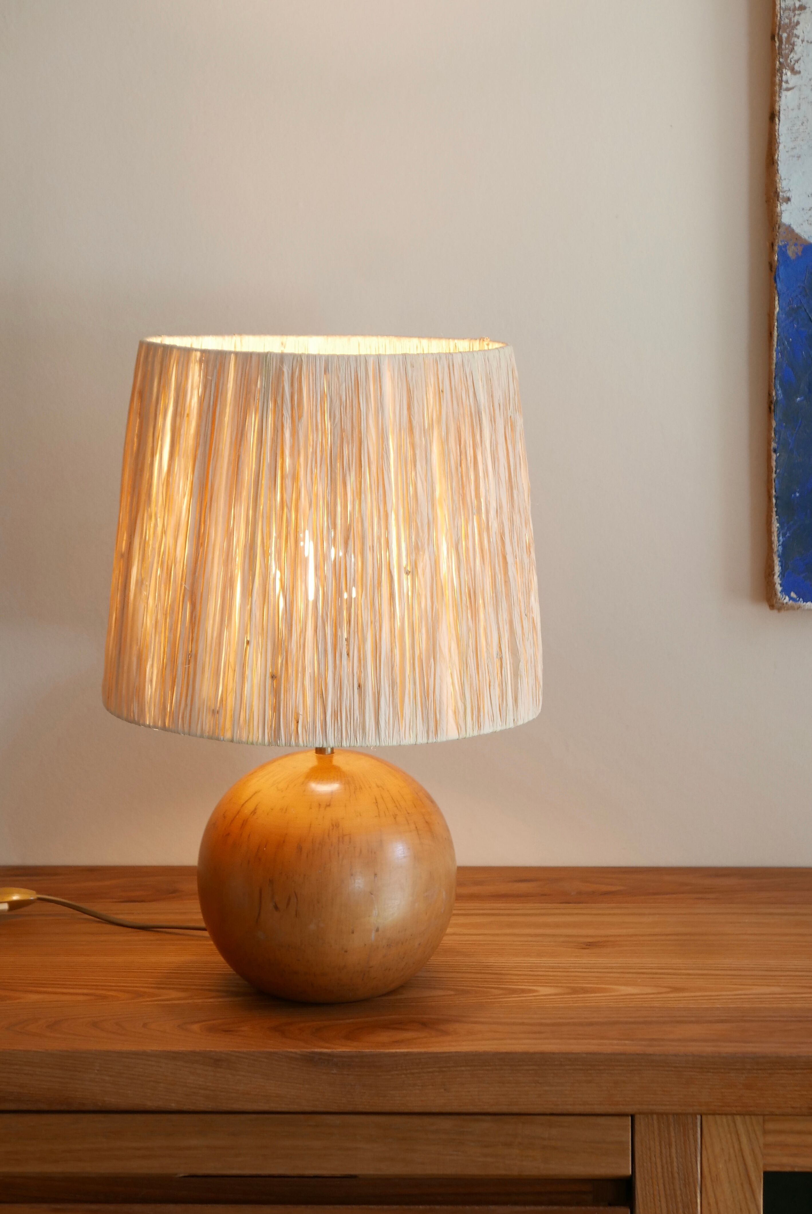 Wooden "ball" lamp, raffia shade, 70s