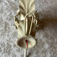 Ecru metal flower wall sconce