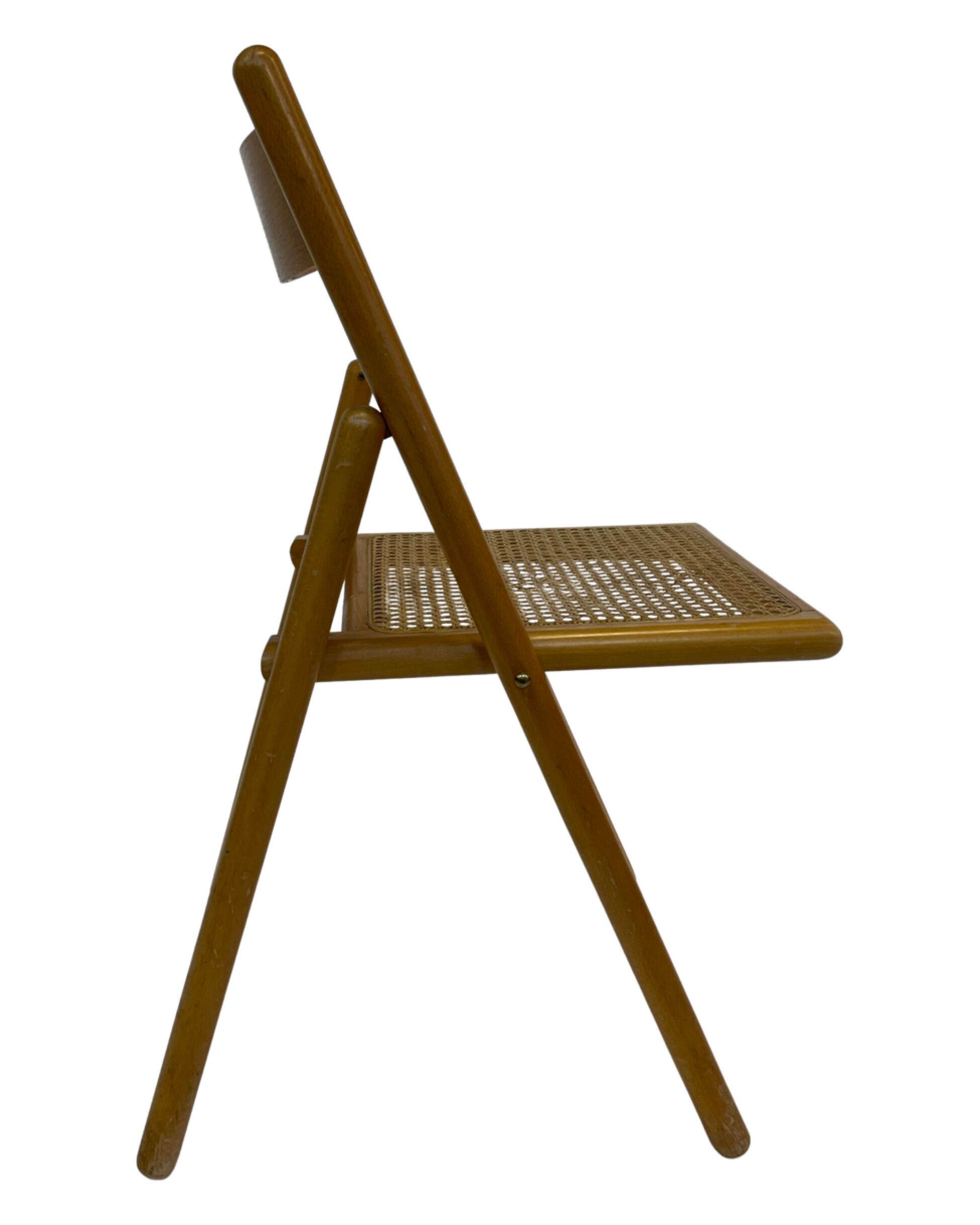 Set of four vintage folding chairs with webbing and wood 1970s