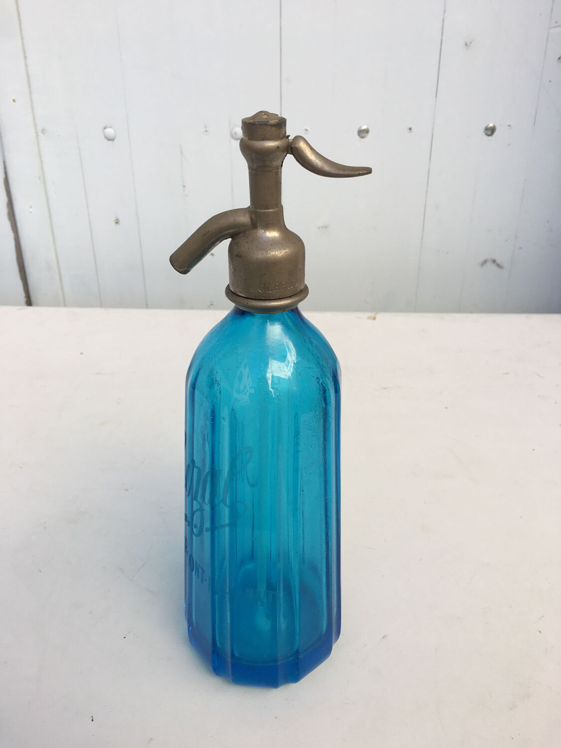 Siphon bleu en verre