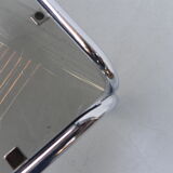 Coffee table with smoked glass top in chromed frame