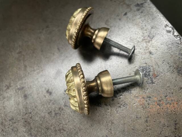 Old brass handle knobs and rosettes