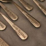 Set of 10 small spoons marked Grand National Railway