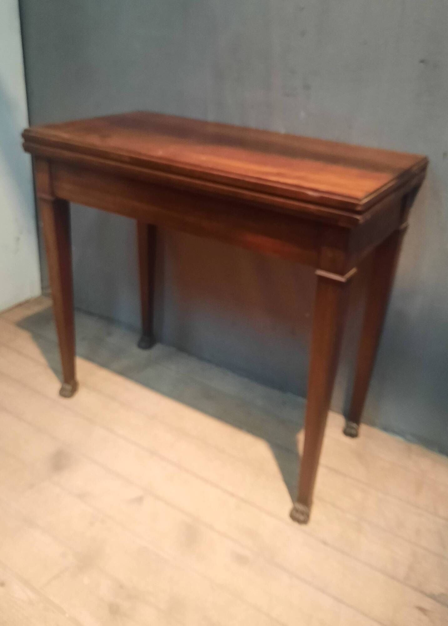 Rectangular console that transforms into a game table.