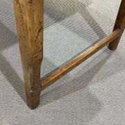 Early 20th-century farmhouse table made of fir, elm, and chestnut.