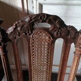 Chair with a decoration of foliage and bunches of grapes