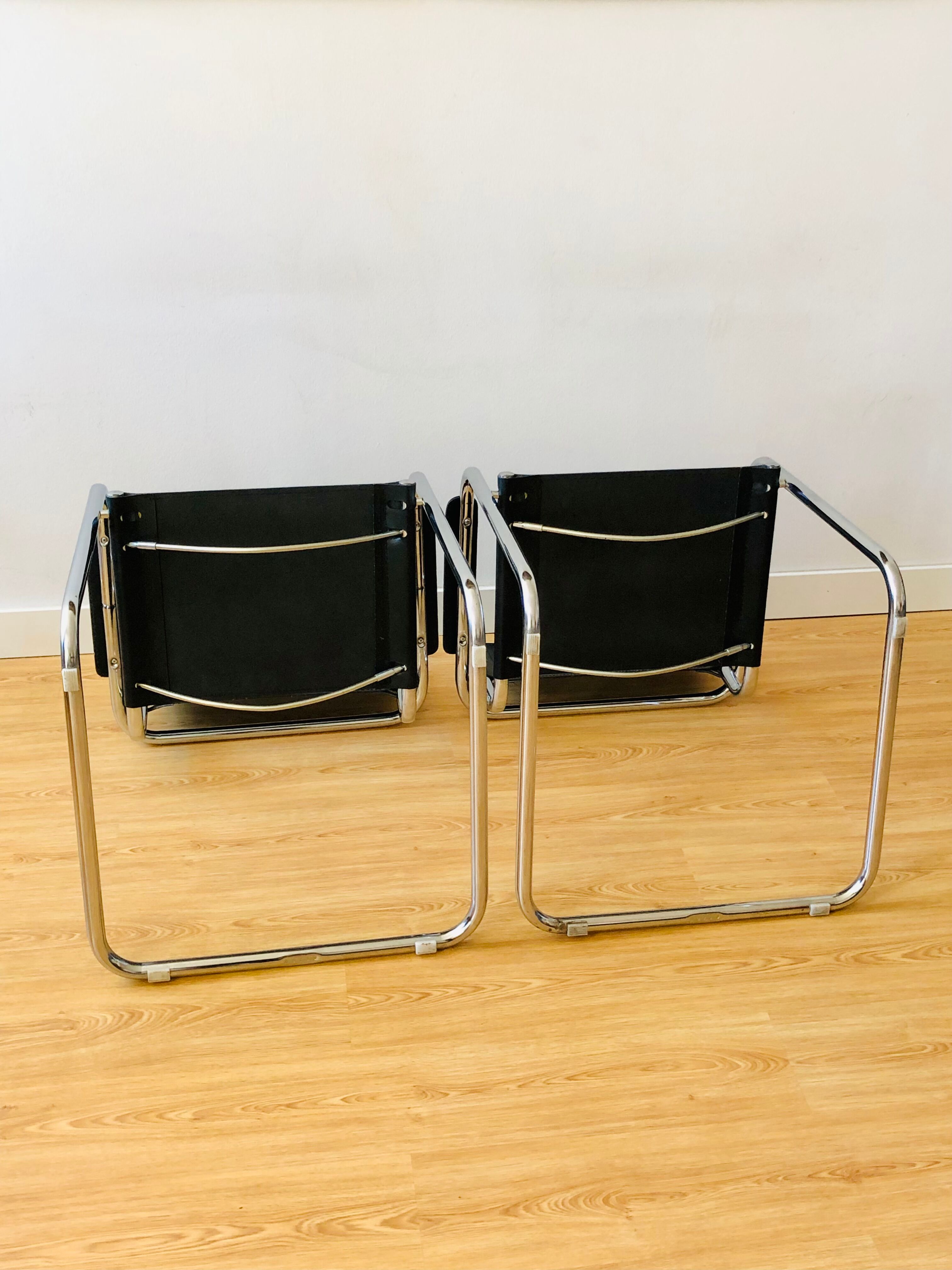 Pair of tubular armchairs in metal and leather Style Marcel Breuer