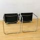 Pair of tubular armchairs in metal and leather Style Marcel Breuer