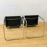 Pair of tubular armchairs in metal and leather Style Marcel Breuer
