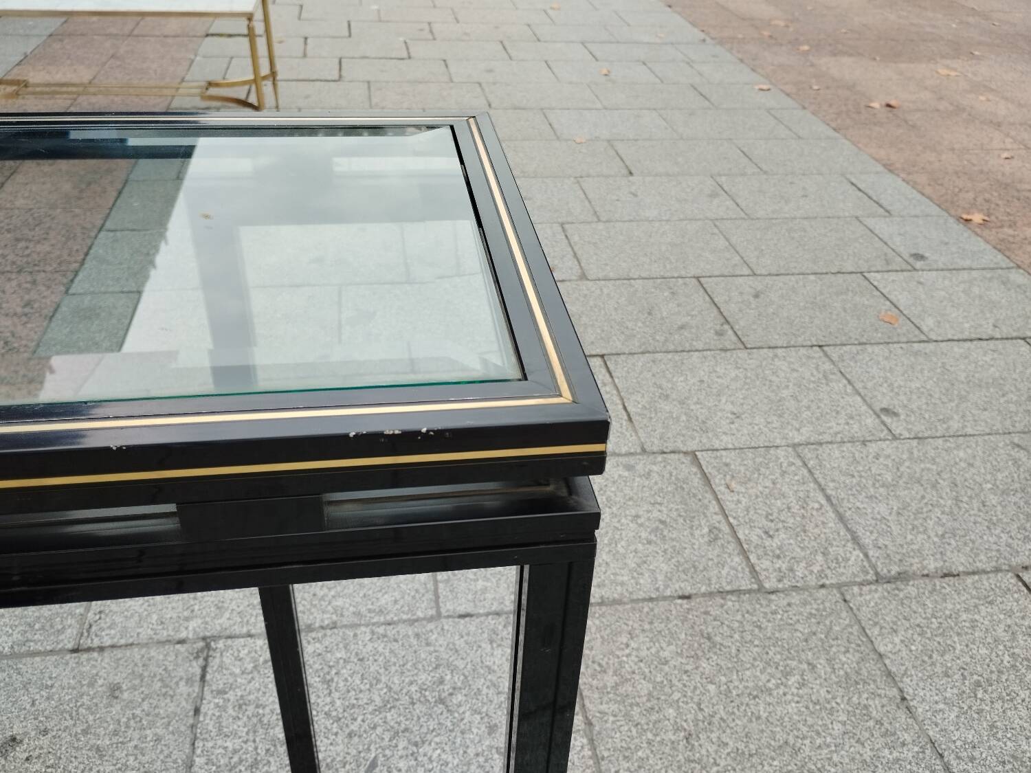Old console with vintage glass top