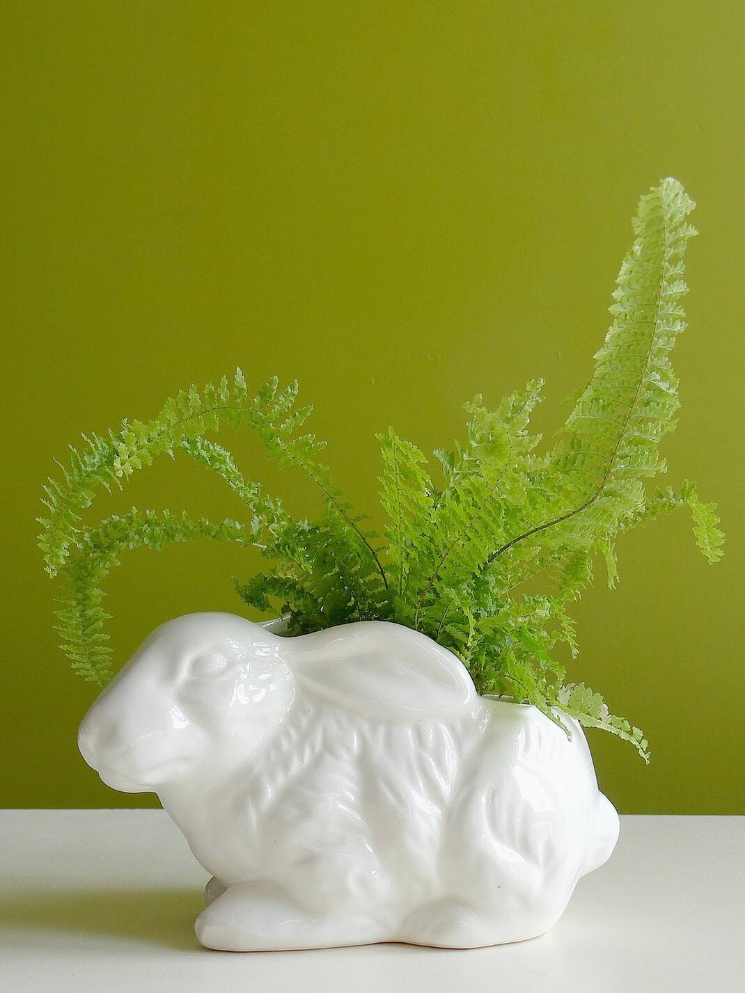 Small earthenware rabbit pot holder