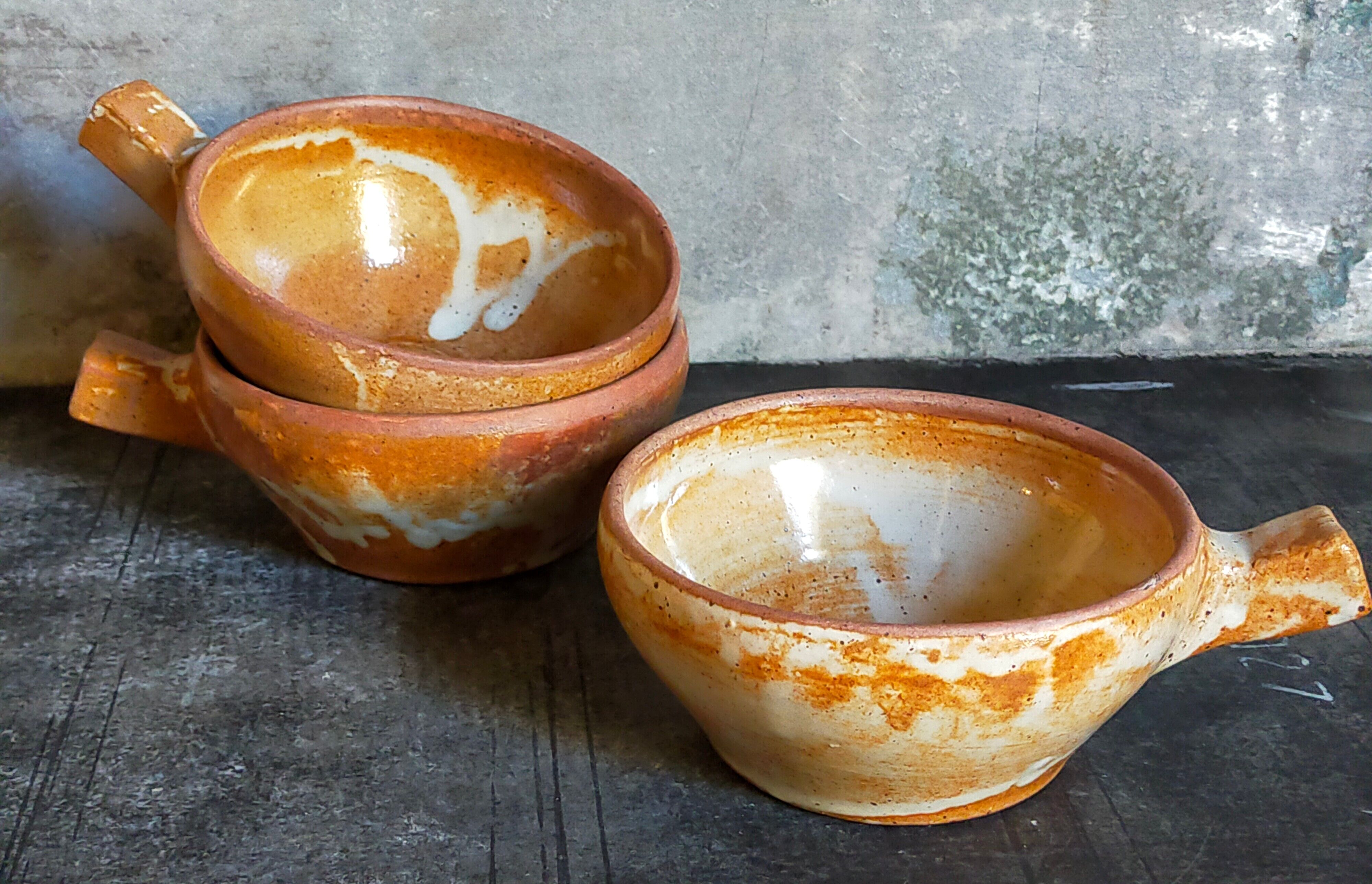 Three vintage marais sandstone bowls