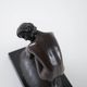 Art Deco female nude figurine – bronze-toned sculpture on geometric base, 1920s/1930s