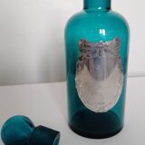 Flacon en verre et son bouchon bleu turquoise