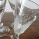 4 antique stemmed wine glasses with flat sides, made of blown glass from the 19th century