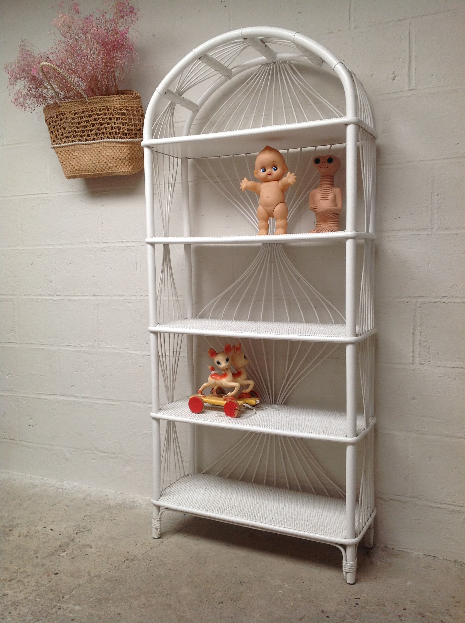 White lacquered rattan bookcase