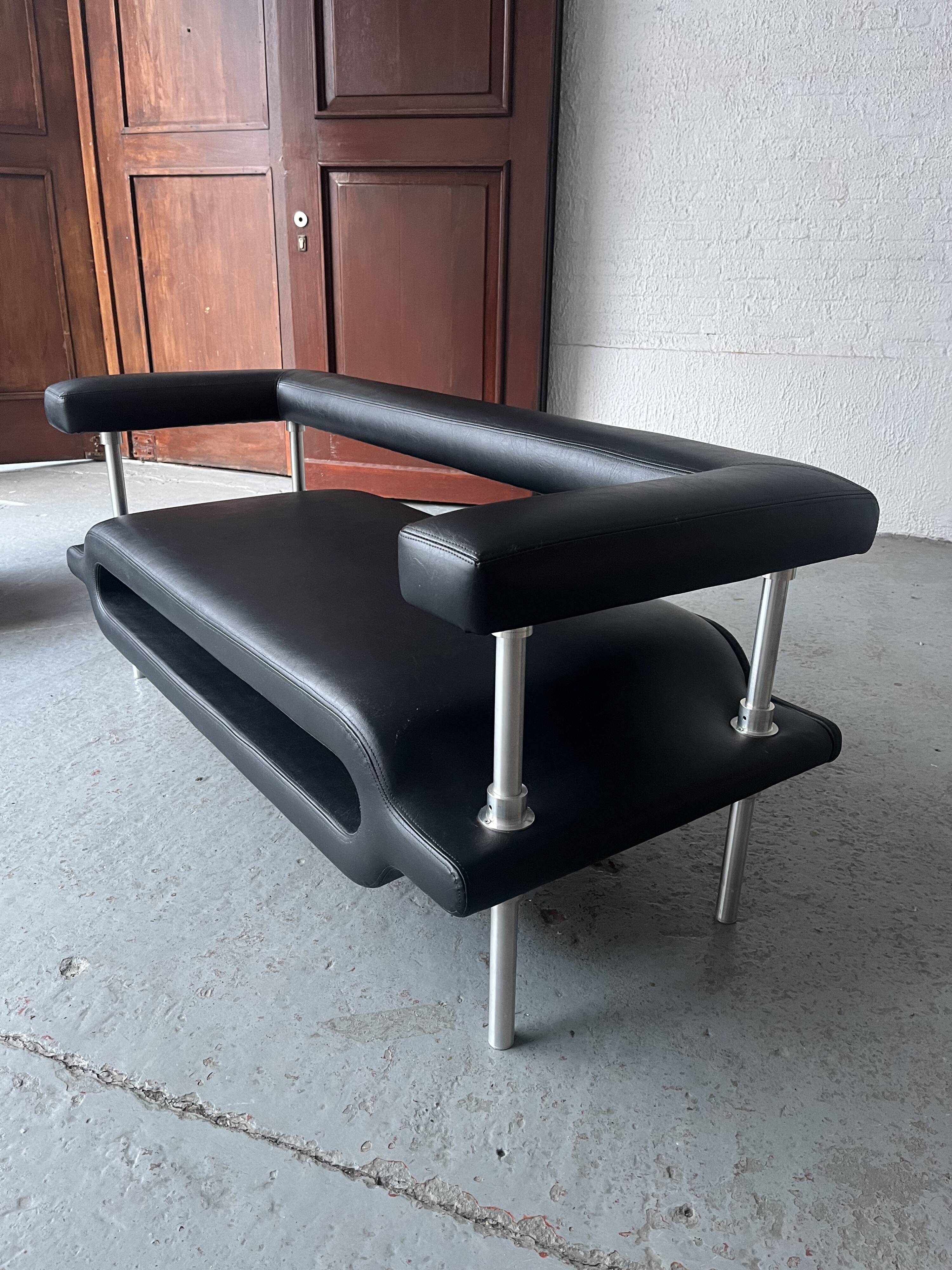 ‘Magazine’ easy chair and 2-seater by Michael Young