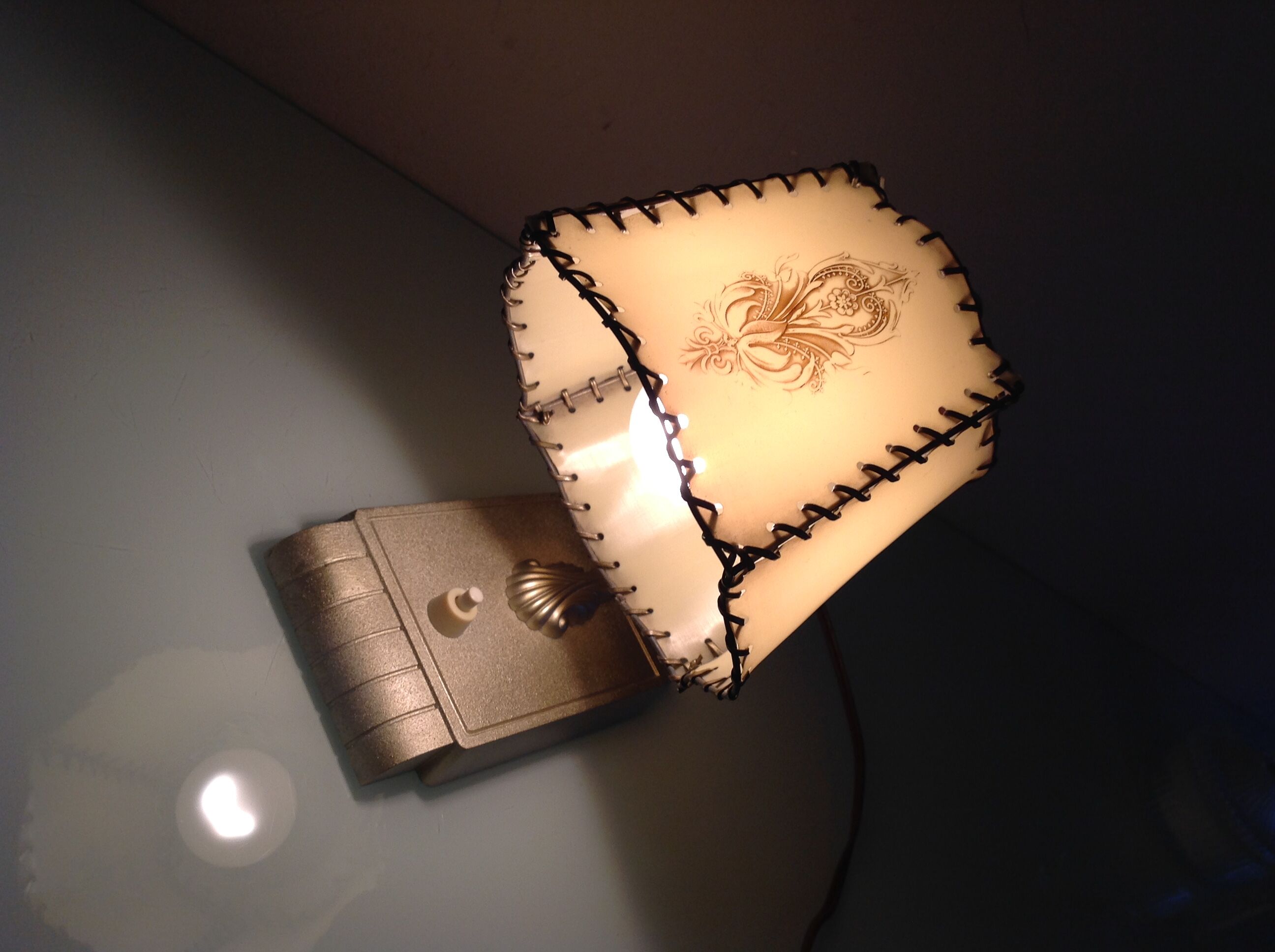 Brass bedside lamp and beige lampshade art deco style