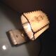 Brass bedside lamp and beige lampshade art deco style