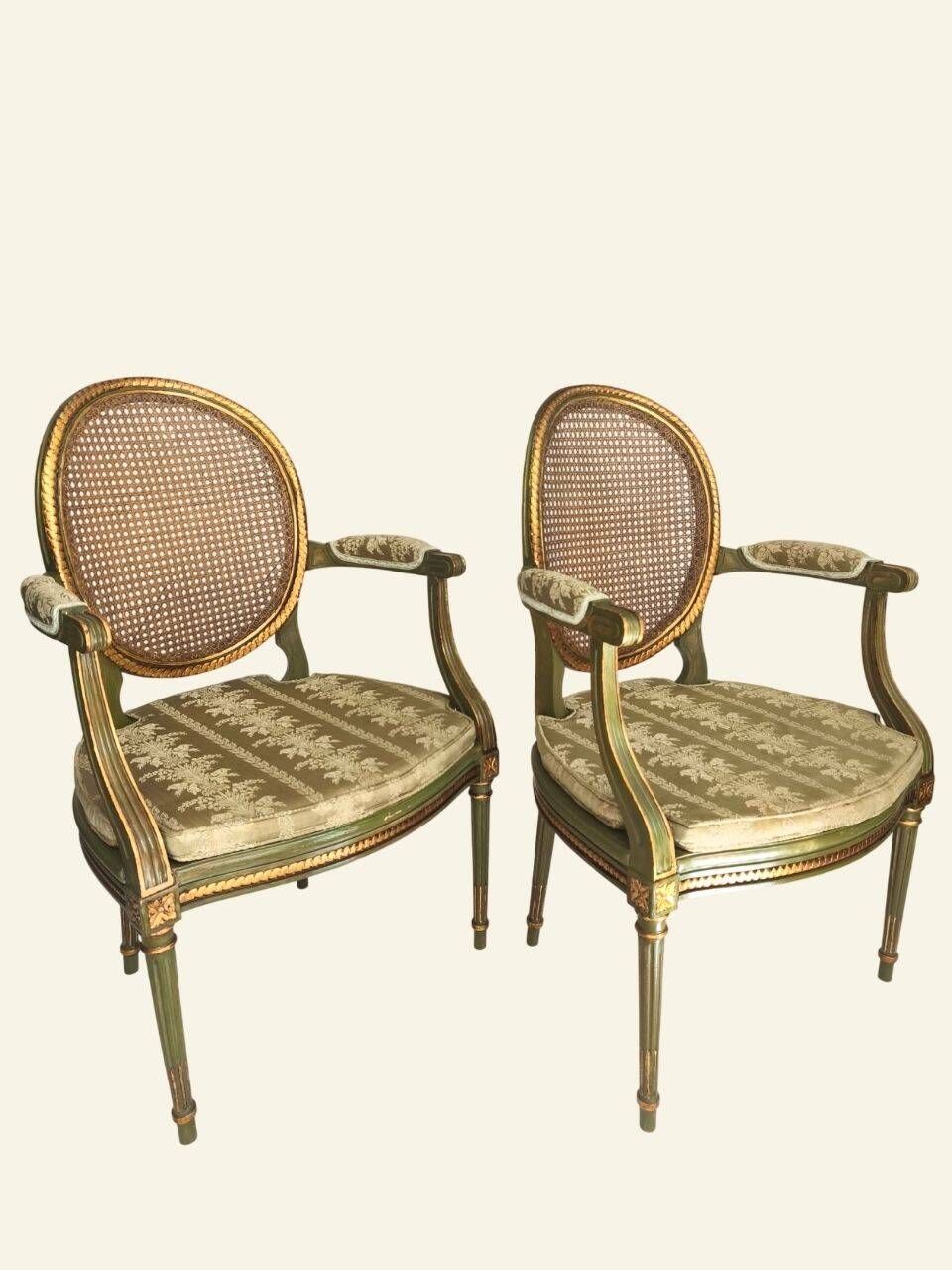 Pair of Louis XVI style armchairs, oval backrest and caning.