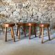 Lot de 4 tabourets en bois tripode art brut