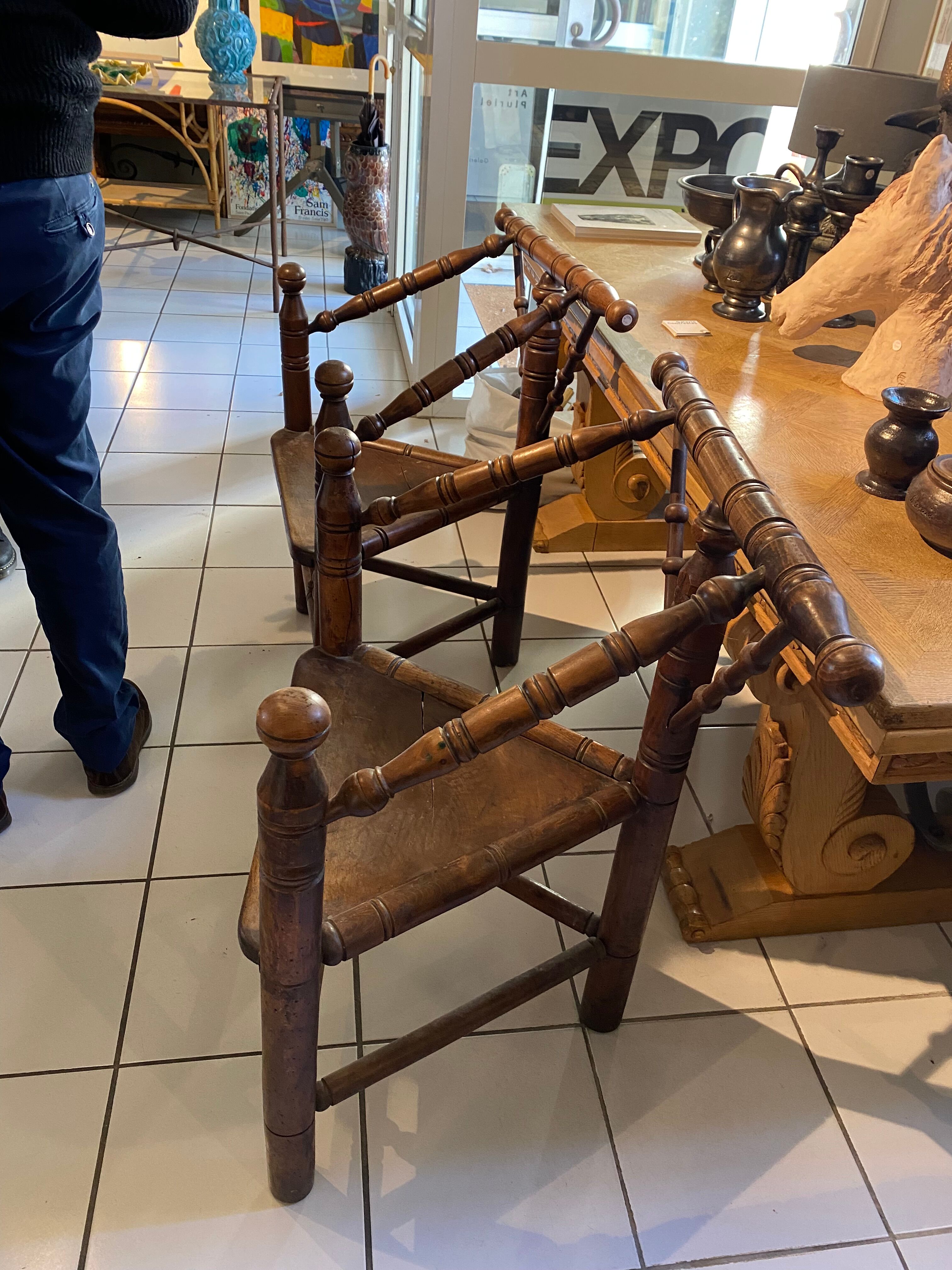 Pair of tripod turner chairs