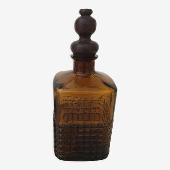 Flacon ancien en verre couleur ambre avec son bouchon en bois et liège