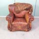 Leather nailed armchair