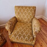 Pair of golden fringed armchairs