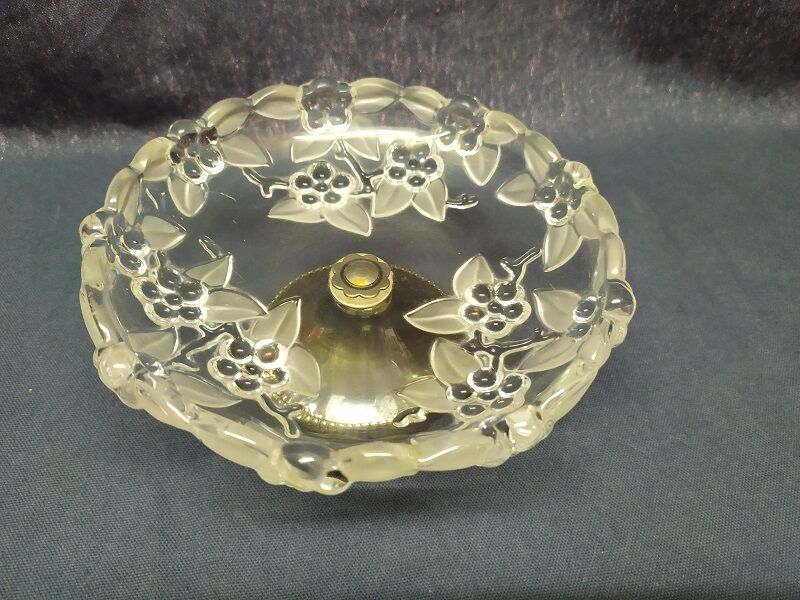 Fruit cut in glass foot silver metal