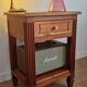 Low cherry wood furniture in Directoire style.